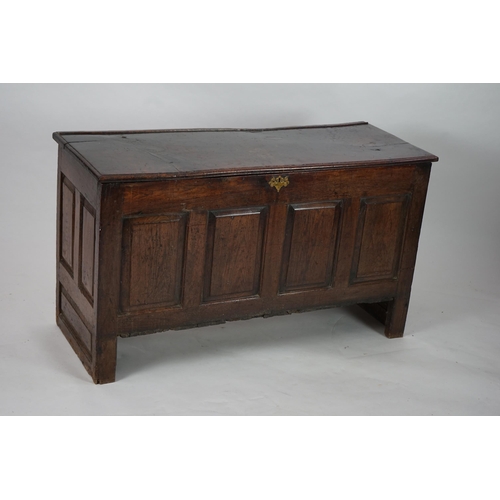 1 - A 17th century panelled oak coffer with plain single plank top and fielded panelled sides, on stile ... 