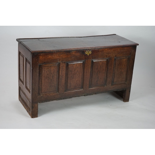 1 - A 17th century panelled oak coffer with plain single plank top and fielded panelled sides, on stile ... 