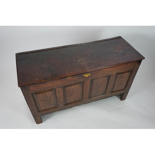 1 - A 17th century panelled oak coffer with plain single plank top and fielded panelled sides, on stile ... 