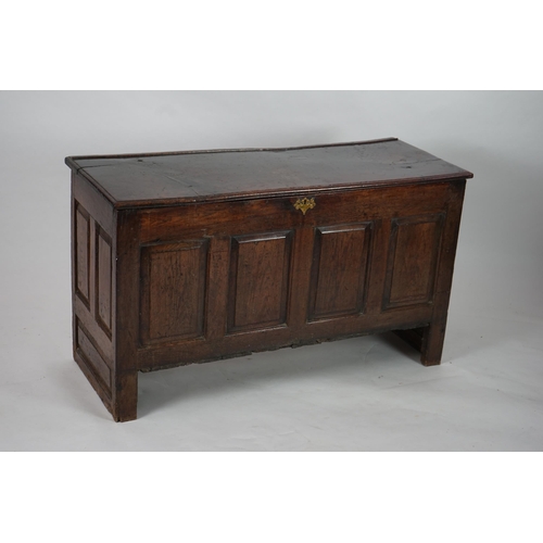 1 - A 17th century panelled oak coffer with plain single plank top and fielded panelled sides, on stile ... 