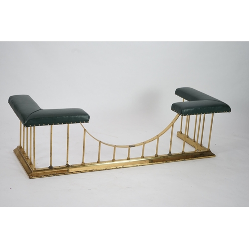 11 - A brass club fender with green leather upholstered padded tops, 175cm wide, 64cm deep, 51cm high... 