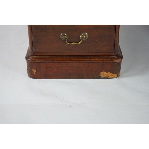 12 - A Victorian mahogany partner's desk with green leather skiver, fitted nine drawers opposing three dr... 