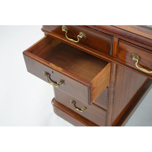 12 - A Victorian mahogany partner's desk with green leather skiver, fitted nine drawers opposing three dr... 