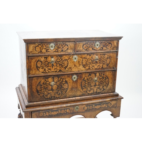 2 - A William and Mary walnut and marquetry chest on stand with floral marquetry panels to the top, fron... 