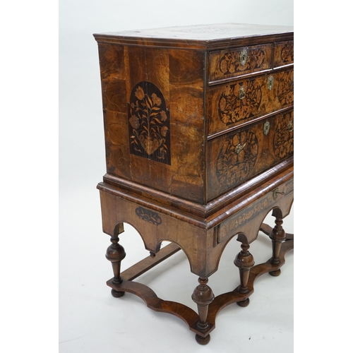 2 - A William and Mary walnut and marquetry chest on stand with floral marquetry panels to the top, fron... 