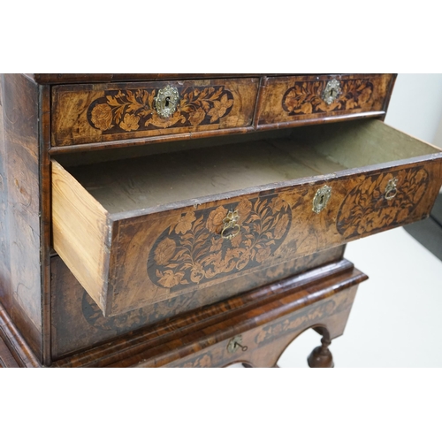 2 - A William and Mary walnut and marquetry chest on stand with floral marquetry panels to the top, fron... 