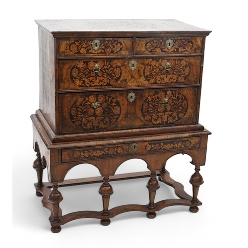 2 - A William and Mary walnut and marquetry chest on stand with floral marquetry panels to the top, fron... 