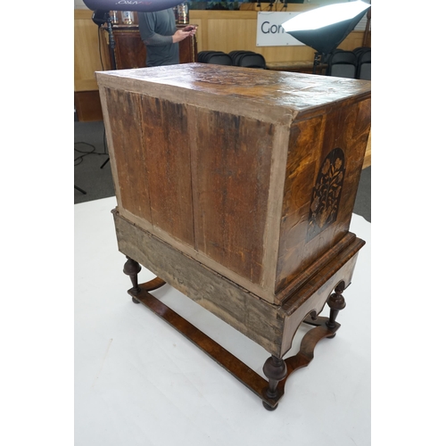 2 - A William and Mary walnut and marquetry chest on stand with floral marquetry panels to the top, fron... 