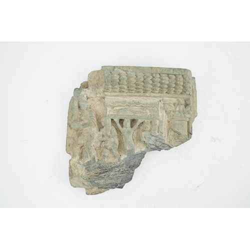 24 - A Gandharan green schist relief fragment, probably 2nd/3rd century AD, 21cm wide, 20cm high