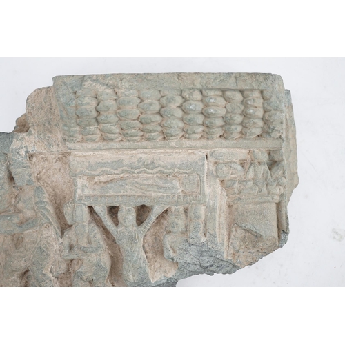 24 - A Gandharan green schist relief fragment, probably 2nd/3rd century AD, 21cm wide, 20cm high