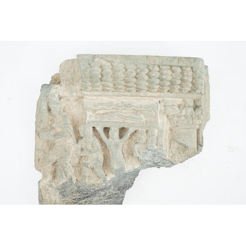 24 - A Gandharan green schist relief fragment, probably 2nd/3rd century AD, 21cm wide, 20cm high