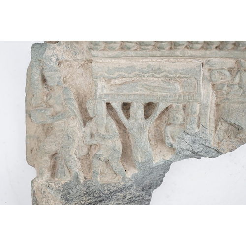 24 - A Gandharan green schist relief fragment, probably 2nd/3rd century AD, 21cm wide, 20cm high