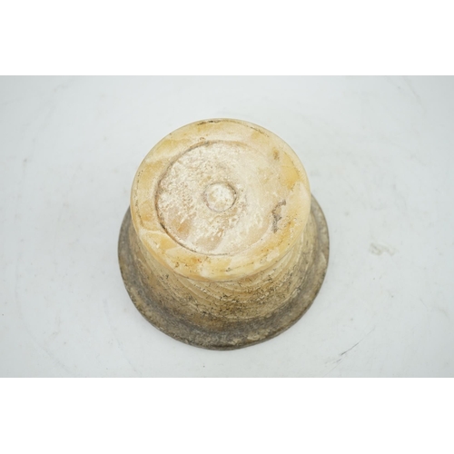 25 - An archaic alabaster footed bowl, possibly Egyptian, mineral encrustation, 15.25cm diameter, 8.5cm h... 