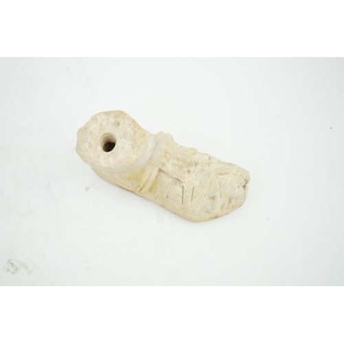 27 - A Roman carved marble model of a sandalled foot, 10cm long, 5.75cm high