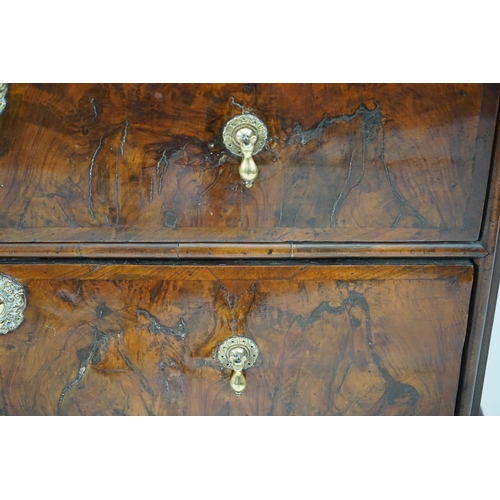 3 - An early 18th century and later crossbanded walnut chest on stand with moulded cornice, two short an... 