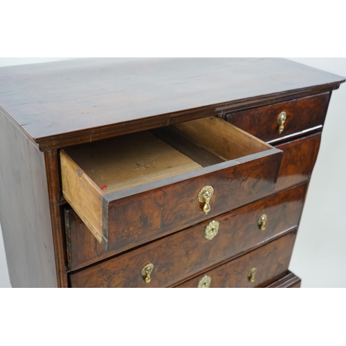 3 - An early 18th century and later crossbanded walnut chest on stand with moulded cornice, two short an... 