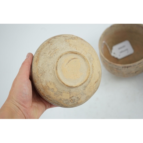 32 - Three Indus Valley pottery bowls, 3rd-2nd millennium BC, each painted in a black pigment, two with o... 