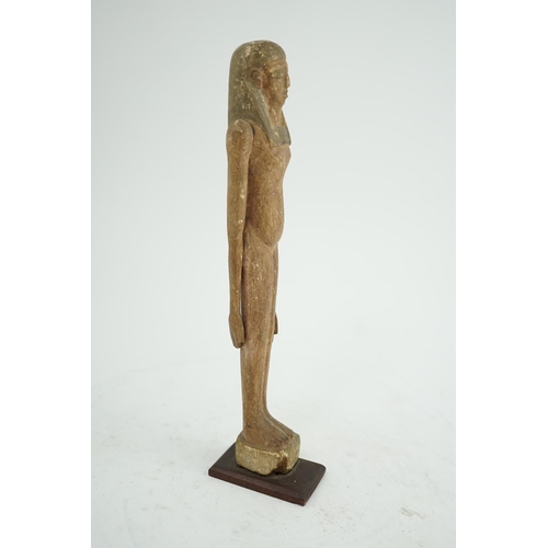 33 - An Egyptian painted gesso and wood portrait statuette of a woman, probably Middle Kingdom, 12th dyna... 