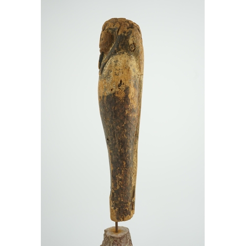 36 - An Ancient Egyptian miniature wood statuette of Ptah-Sokar-Osiris, probably late Kingdom, on a later... 