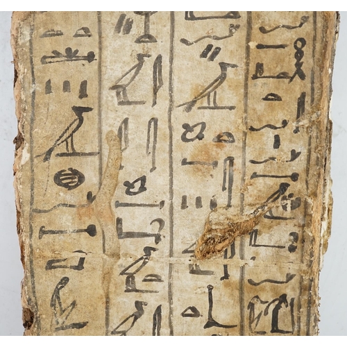 38 - An Ancient Egyptian painted gesso, linen and wood fragment from a coffin or canopic chest, probably ... 