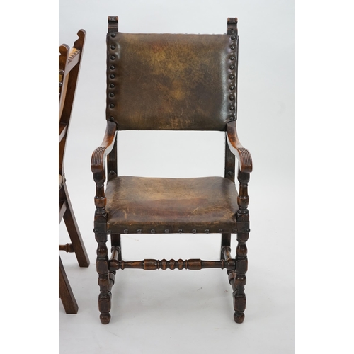 4 - A set of fourteen 17th century style oak dining chairs including a pair of carvers, with brass studd... 