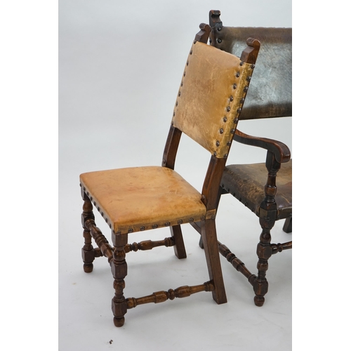 4 - A set of fourteen 17th century style oak dining chairs including a pair of carvers, with brass studd... 