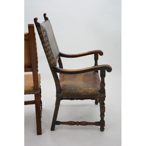 4 - A set of fourteen 17th century style oak dining chairs including a pair of carvers, with brass studd... 