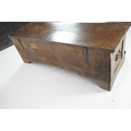 55 - A mid 18th century German carved oak marriage chest with single planked lid, the frieze, initialled ... 