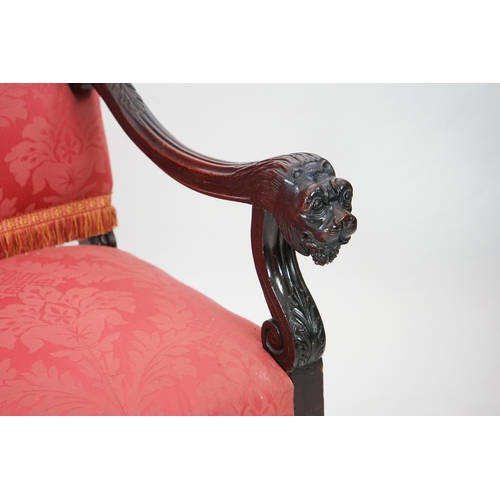 6 - A 17th century style walnut settee with upholstered back and seat, acanthus carved scroll arms with ... 