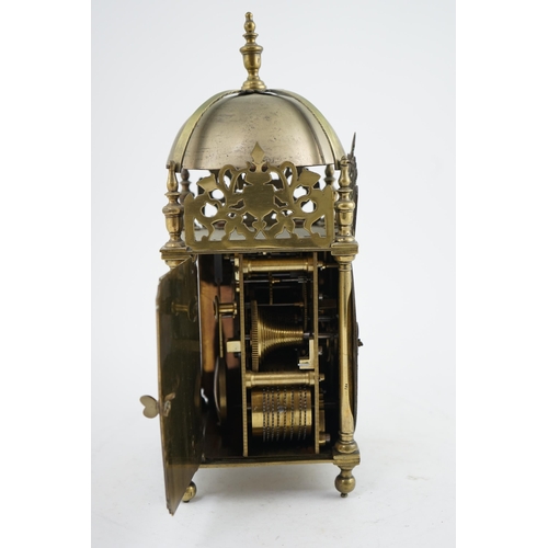 62 - Thomas Barrett of Lewis, [Lewes]. An 18th century brass lantern clock, in traditional case with armo... 