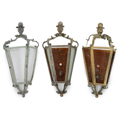 65 - A set of three antique French brass wall lights of demi-hexagonal lantern form, with foliate and bal... 