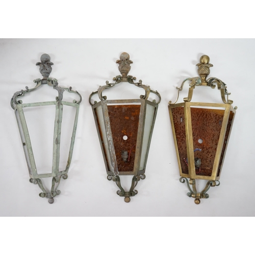 65 - A set of three antique French brass wall lights of demi-hexagonal lantern form, with foliate and bal... 