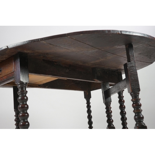 66 - A 17th century and later oak gateleg table with oval drop leaf top and single frieze drawer, on bobb... 