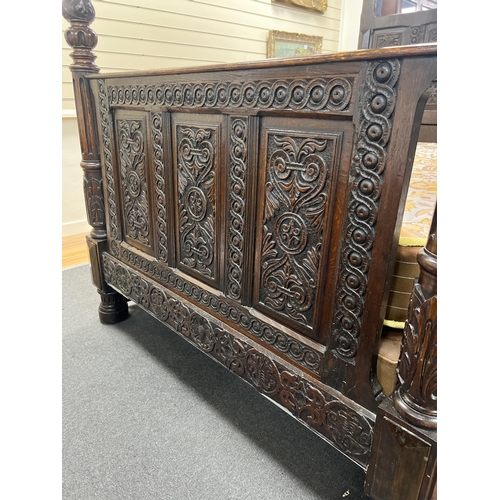 67 - A 17th century and later oak full tester bedstead with moulded cornice and stop fluted acanthus carv... 