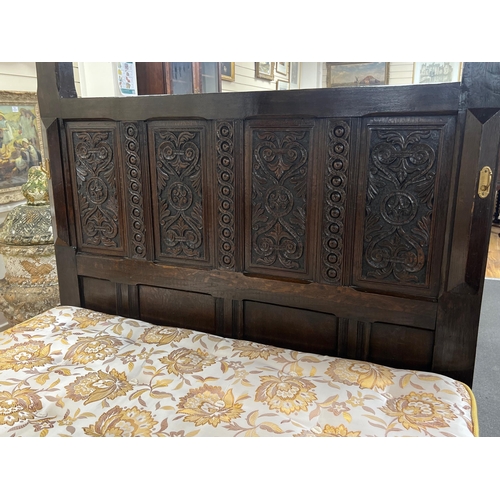 67 - A 17th century and later oak full tester bedstead with moulded cornice and stop fluted acanthus carv... 