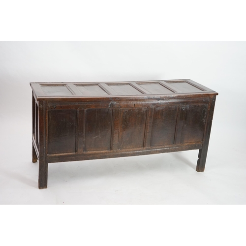 68 - A 17th century oak coffer with five panel top, on squared stile feet, 172cm wide, 57cm deep, 85cm hi... 