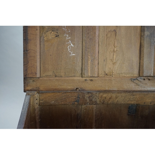 68 - A 17th century oak coffer with five panel top, on squared stile feet, 172cm wide, 57cm deep, 85cm hi... 