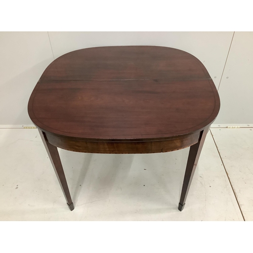 100 - A Regency ebony strung mahogany folding tea table, width 92cm, height 74cm. Condition - fair to good... 