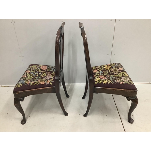 101 - A pair of Queen Anne style walnut dining chairs, height 97cm. Condition - poor