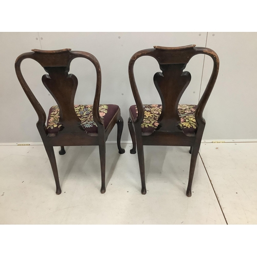 101 - A pair of Queen Anne style walnut dining chairs, height 97cm. Condition - poor