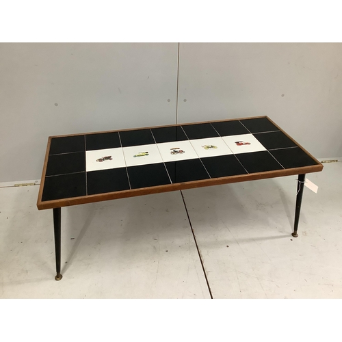 108 - A 1960s tile top coffee table, width 110cm, depth 48cm, height 51cm. Condition - fair to good