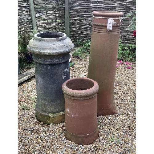 19 - Three assorted terracotta chimney pots, largest height 90cm. Condition - weathered, some small chips... 