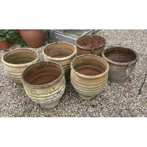 20 - A set of four Minos Italian style terracotta planters, height 35cm, depth 40cm, and a pair of simila... 