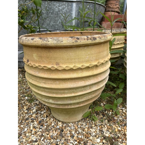 20 - A set of four Minos Italian style terracotta planters, height 35cm, depth 40cm, and a pair of simila... 