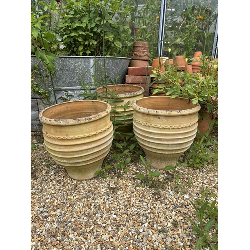 20 - A set of four Minos Italian style terracotta planters, height 35cm, depth 40cm, and a pair of simila... 