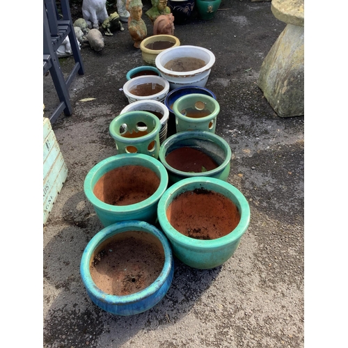 22 - A collection of assorted glazed pottery garden pots and ornaments, largest diameter 42cm. Condition ... 