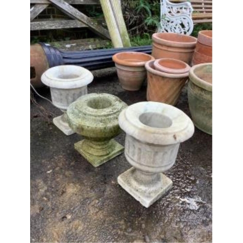 26 - A pair of reconstituted stone garden urns, height 55cm and three assorted marble urns. Condition - a... 