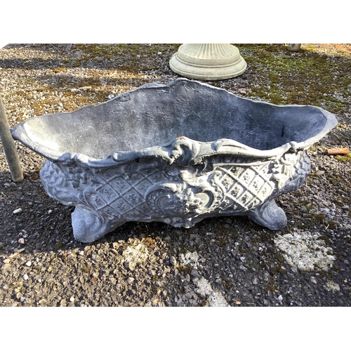 31 - A set of four cast iron planters, width 36cm, and a pair of more ornate planters, width 48cm. Condit... 