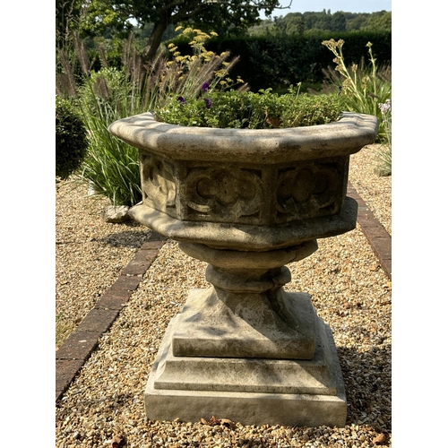 8 - A reconstituted stone font planter, height 72cm, width 62cm. planting removed. Condition - weathered... 