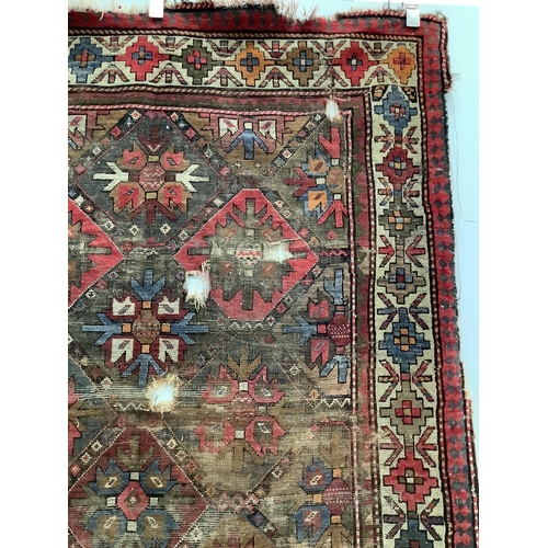 87 - An antique Caucasian geometric rug, 250 x 140cm, together with a Belouch prayer rug, 130 x 78cm. Con... 